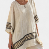 Mariella – top às riscas negras elegante e calças fluidas
