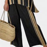 Tamara – top às riscas oversized confortável e calças relaxadas