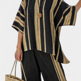 Tamara – top às riscas oversized confortável e calças relaxadas