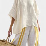 Arianna – top às riscas amarelas elegante e calças de perna larga