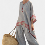Rossella – blusa assimétrica sofisticada e calças étnicas de perna larga