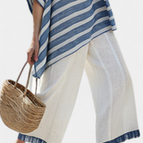 Ornella – top azul sofisticado às riscas e calças com detalhes na parte inferior