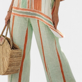 Elisabetta – top assimétrico elegante e calças de perna larga