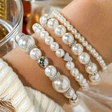 Conjunto de elegantes pulseiras de coração com pérolas