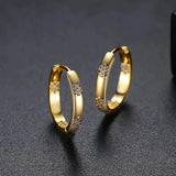 Brincos vintage com flor em ouro