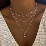 Colar vintage com estrelas