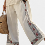 Tiziana – blusa bordada essencial e calças largas